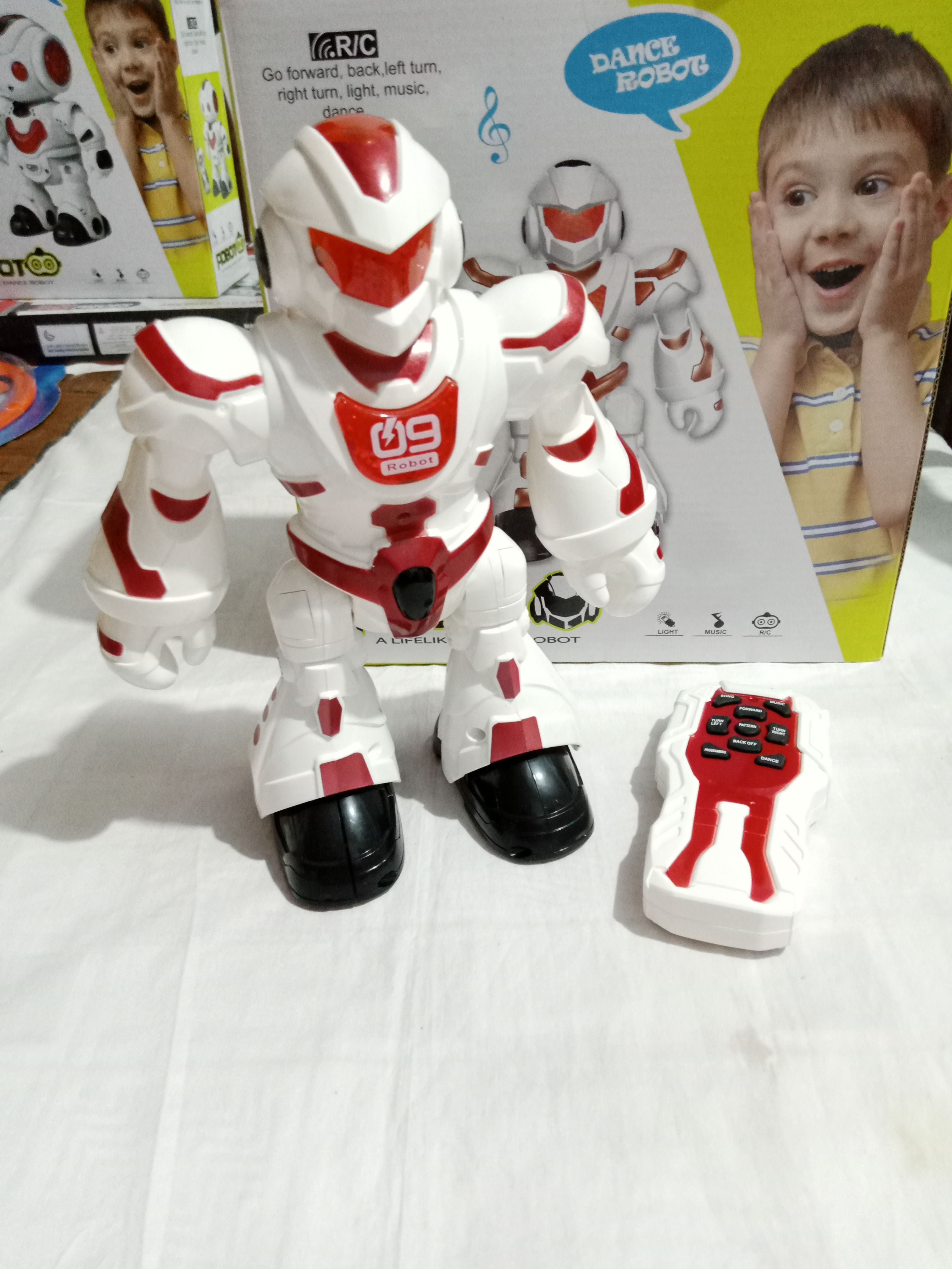 Dancing Robot -R/C - Dance, walk and Light - Red Warrior - Oshi.pk - Buy & Sell Online