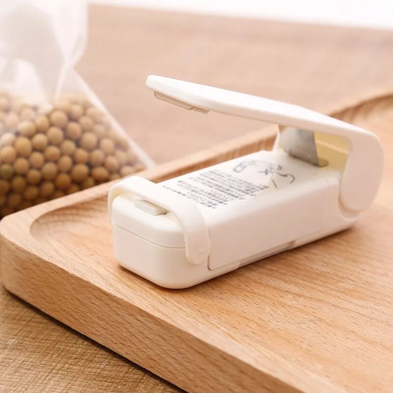 Mini Heat Bag Sealing Machine Package Sealer Bags Thermal Plastic Food Bag Closure Portable Sealer Packing - Oshi.pk - Buy & Sell Online