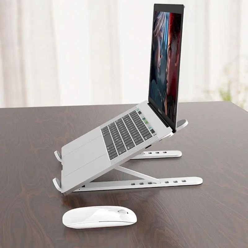 New High Quality Laptop Stand - Adjustable Portable Laptop Stand For Desk - Foldable Plastic Non-Slip Stand For Laptop And Tablet - Oshi.pk - Buy & Sell Online