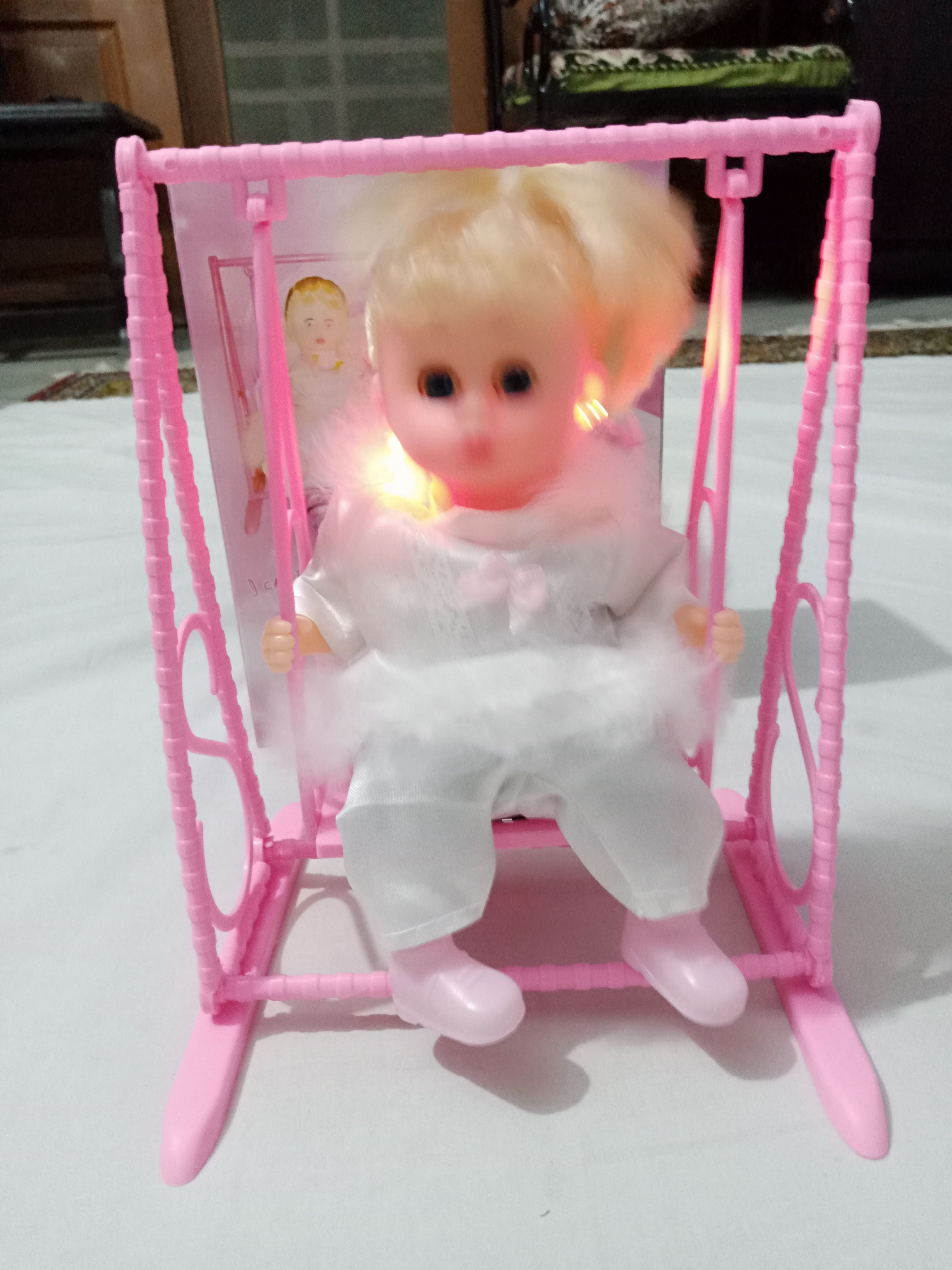 Swinging Doll - Battery operated - Music with Swing - Oshi.pk - Buy & Sell Online