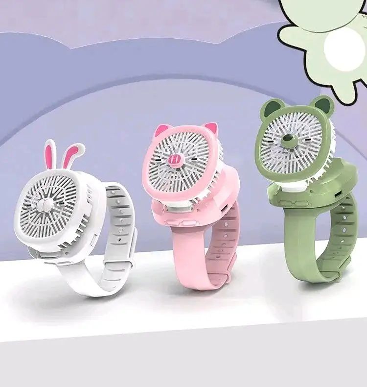 Watch Fan Cartoon with Wrist Strap Rechargeable 3 Levels Adjustable Handheld Fan for TravelLow - Oshi.pk - Buy & Sell Online