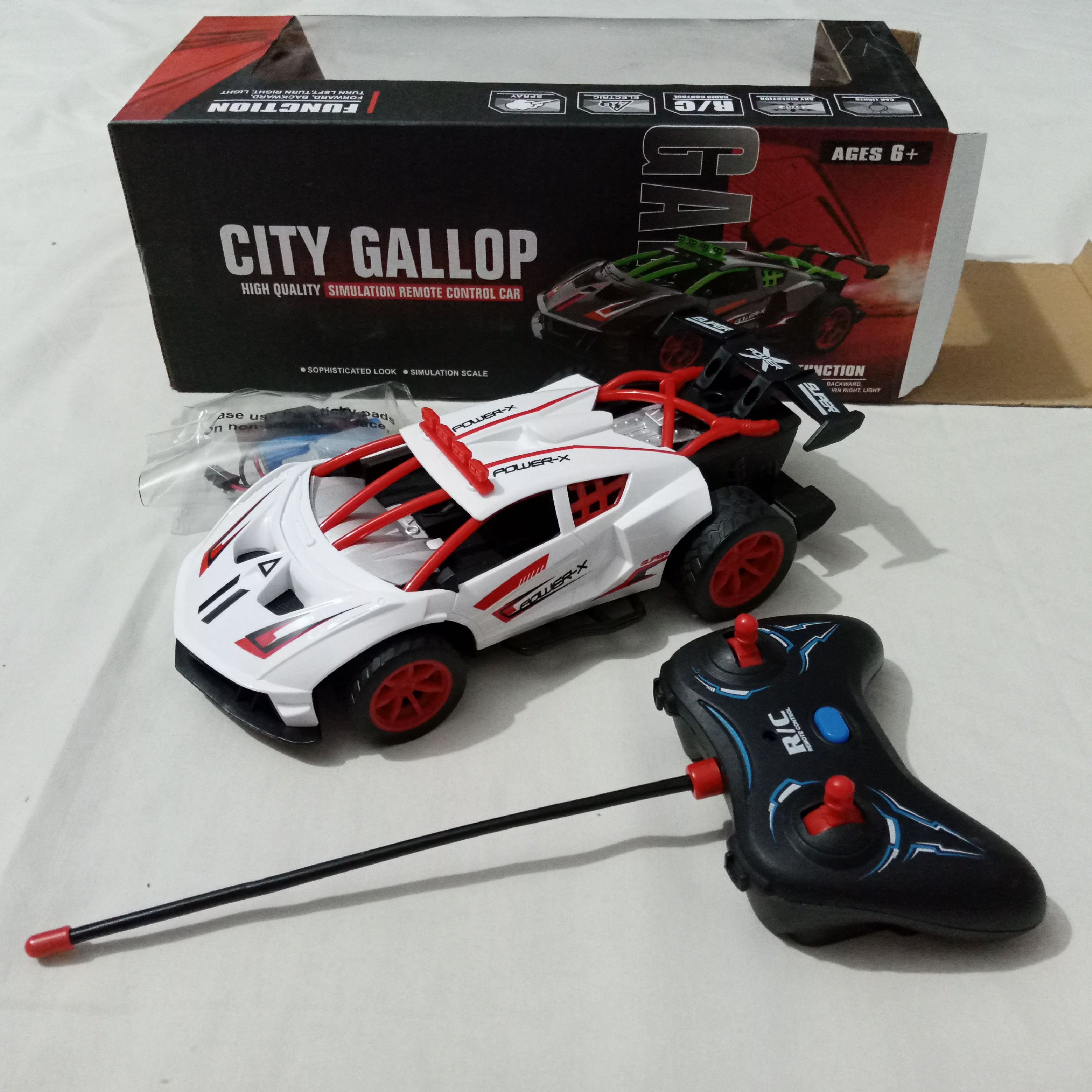City Gallop Racing Car - Remote Control - Rechargeable Battery - Drop Water in and get Smoke - Oshi.pk - Buy & Sell Online