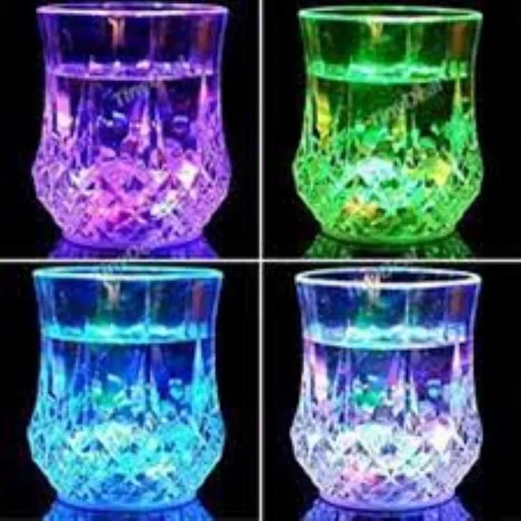 Colorful flashing LED light up glass LED pineapple cup New Led Glowing Mug Glass Water Liquid Inductive Rainbow Color Changing Flashing Light Cup - Oshi.pk - Buy & Sell Online