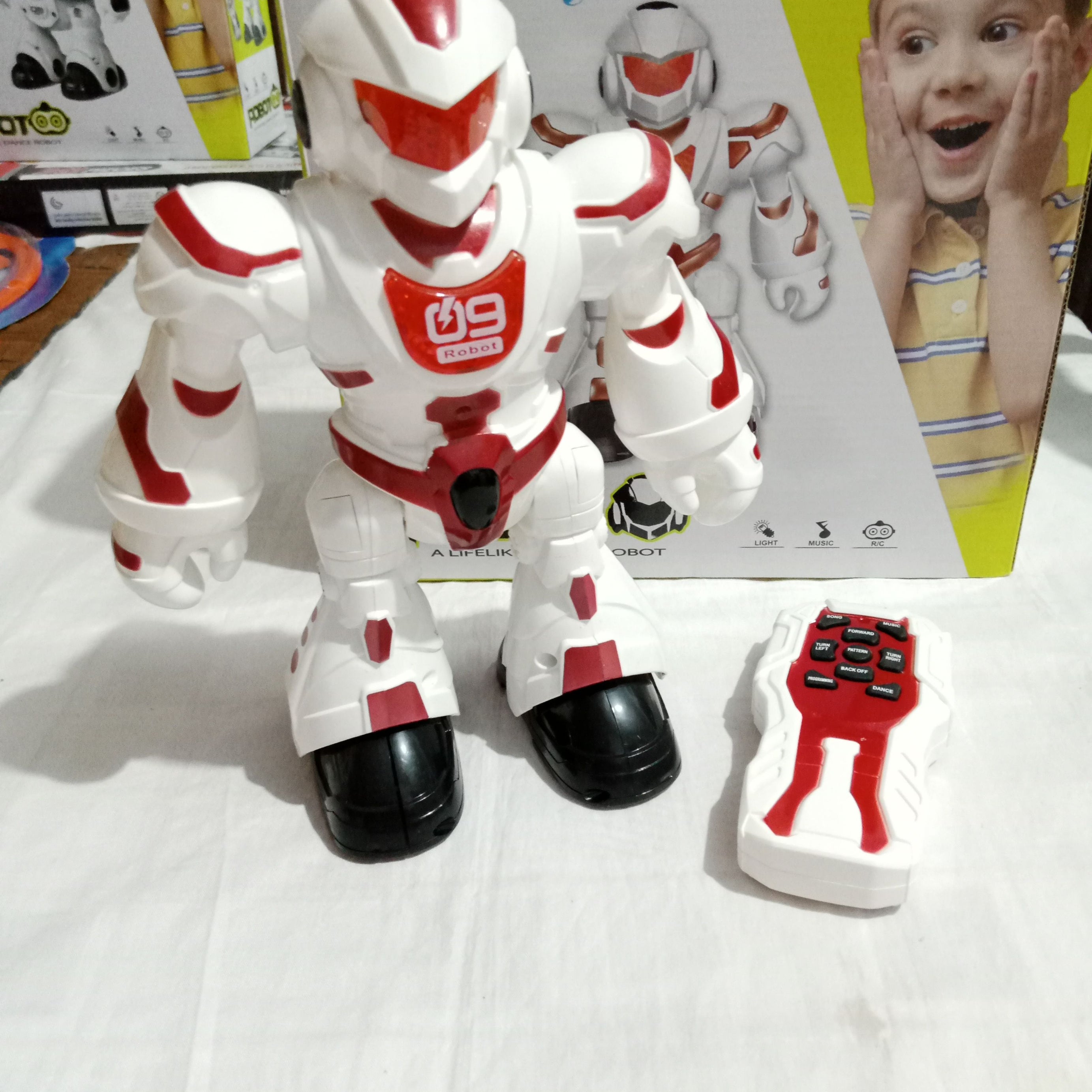 Dancing Robot -R/C - Dance, walk and Light - Red Warrior - Oshi.pk - Buy & Sell Online