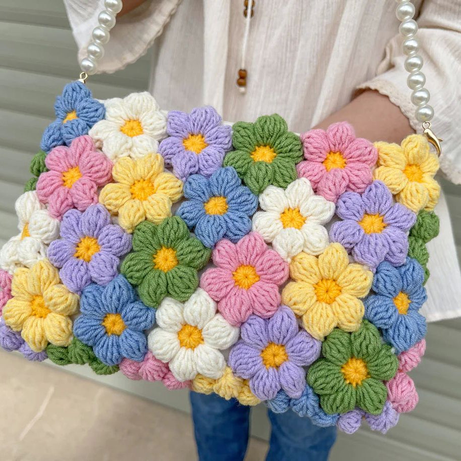 Handmade Crochet Bag Featuring a Burst of Multicolor Flower Patterns : Stylish Handcrafted Crochet Bag with Floral Design - Oshi.pk - Buy & Sell Online
