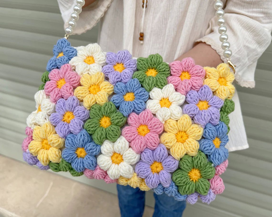 Handmade Crochet Bag Featuring a Burst of Multicolor Flower Patterns : Stylish Handcrafted Crochet Bag with Floral Design - Oshi.pk - Buy & Sell Online