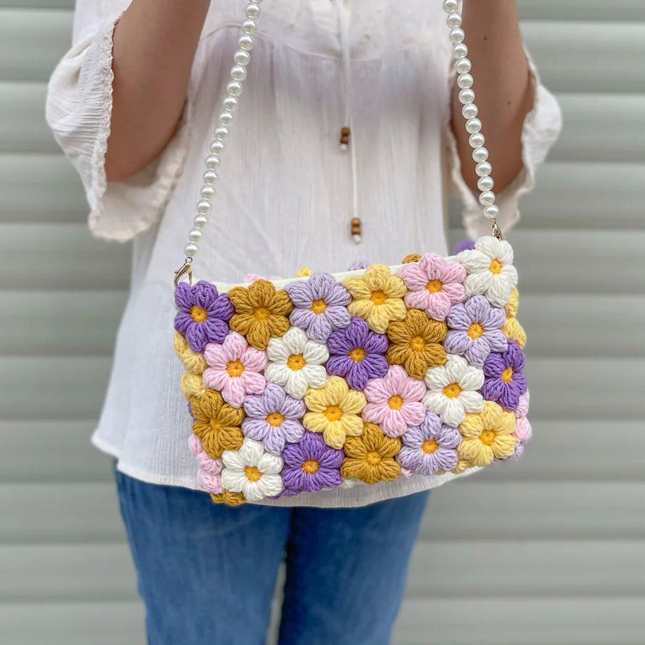 Handmade Crochet Bag Featuring a Burst of Multicolor Flower Patterns : Stylish Handcrafted Crochet Bag with Floral Design - Oshi.pk - Buy & Sell Online