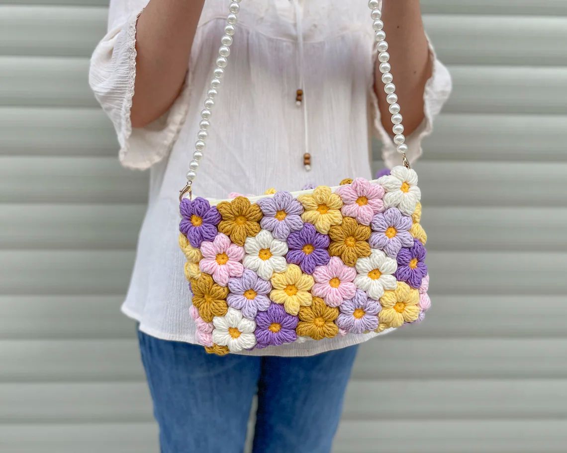 Handmade Crochet Bag Featuring a Burst of Multicolor Flower Patterns : Stylish Handcrafted Crochet Bag with Floral Design - Oshi.pk - Buy & Sell Online