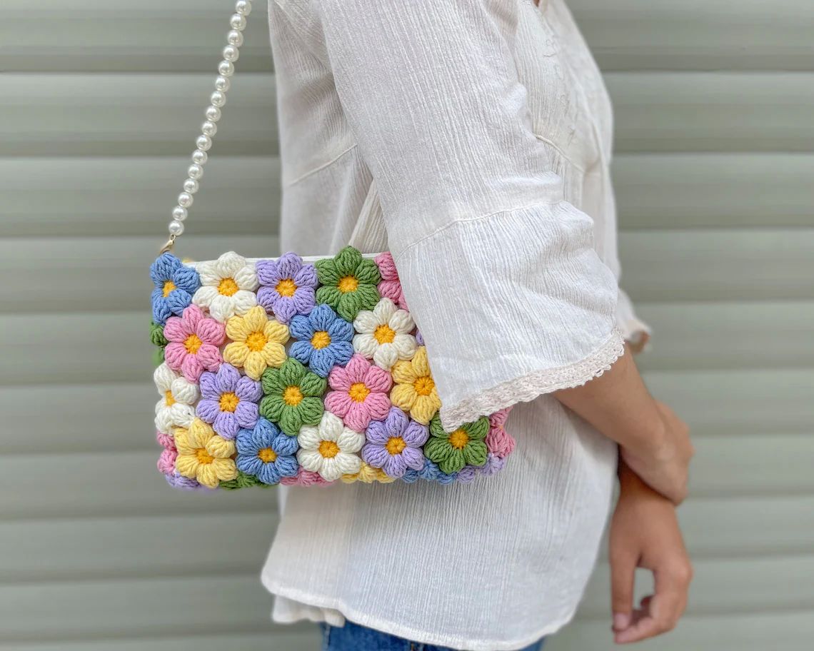 Handmade Crochet Bag Featuring a Burst of Multicolor Flower Patterns : Stylish Handcrafted Crochet Bag with Floral Design - Oshi.pk - Buy & Sell Online