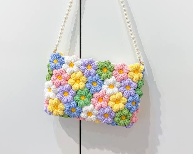 Handmade Crochet Bag Featuring a Burst of Multicolor Flower Patterns : Stylish Handcrafted Crochet Bag with Floral Design - Oshi.pk - Buy & Sell Online