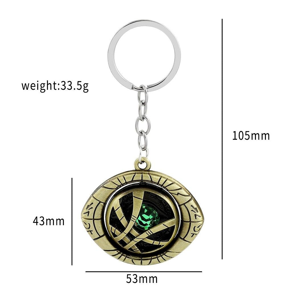 Marvel Avengers Doctor Strange Eye Pendant Keyring The Time Stone Metal Keychain Turnable Avengers Backpack Pendant Accessories Birthday Gift - Oshi.pk - Buy & Sell Online