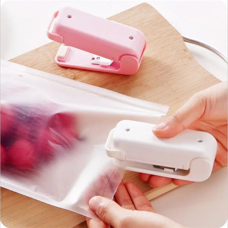 Portable Mini Sealer Home Heat Bag Plastic Food Snacks Bag Sealing Machine Food Packaging Kitchen Storage Bag Clips - Oshi.pk - Buy & Sell Online
