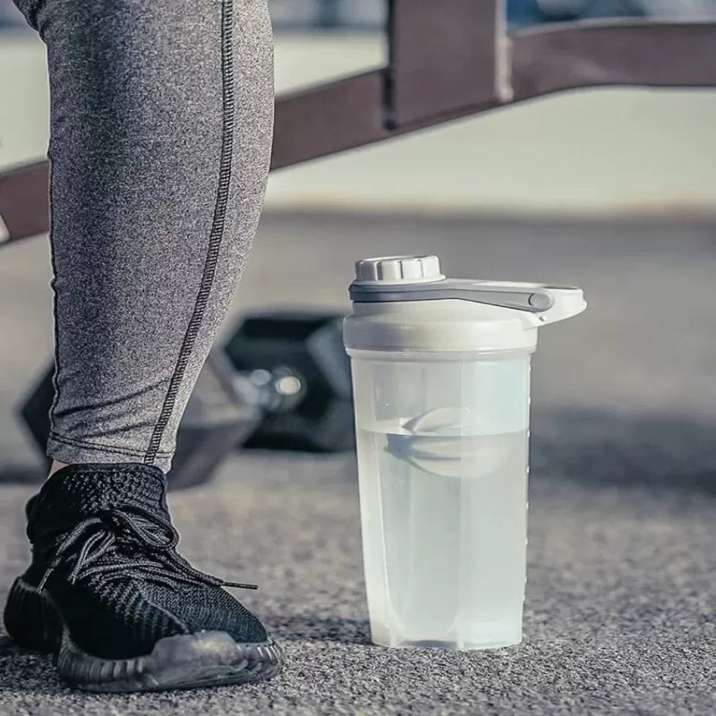 Protein Shaker Bottle Sports Gym Water Bottle Multi-Purpose Shaker with Mix Ball Blender Bottle BPA Free Plastic Easy Grip Leak Proof 700ml - Oshi.pk - Buy & Sell Online