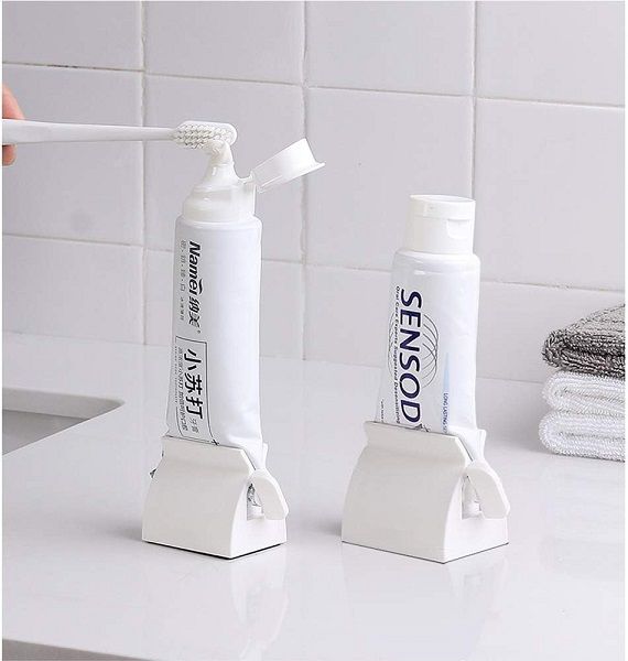 Rolling Tube Toothpaste Holder Stand Bathroom Organizer - Oshi.pk - Buy & Sell Online