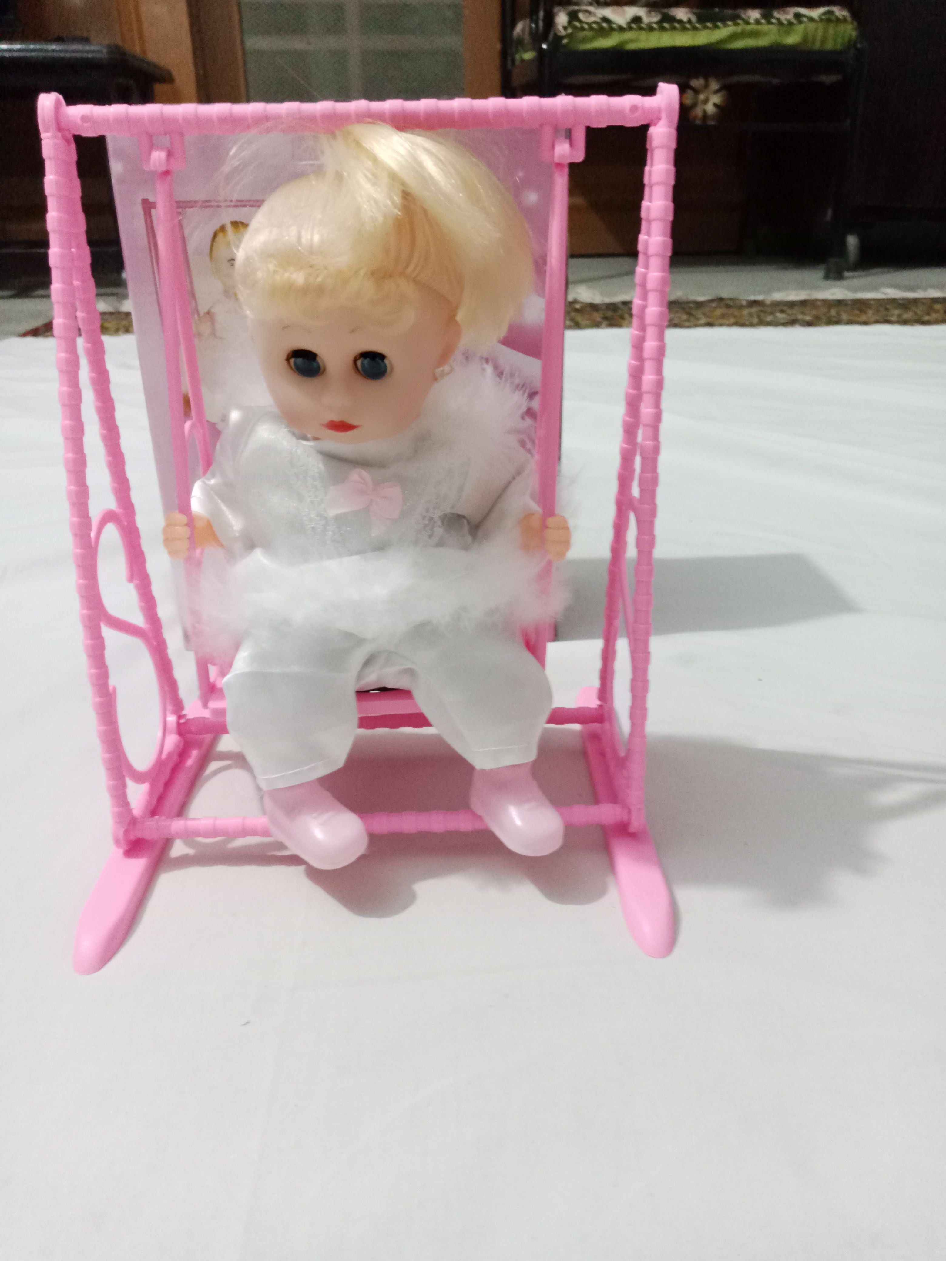 Swinging Doll - Battery operated - Music with Swing - Oshi.pk - Buy & Sell Online