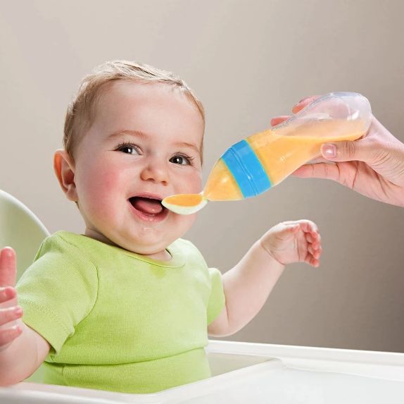 https://www.oshi.pk/images/variation/baby-spoon-feeder-90ml-silicone-baby-feeding-bottle-with-spoon-newborn-infant-squeeze-spoon-toddler-food-supplement-rice-cereal-bottle-milk-feeder-16477-839.jpg